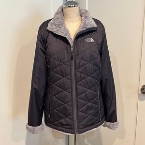 The North Face women’s zip front fall winter jacket.
